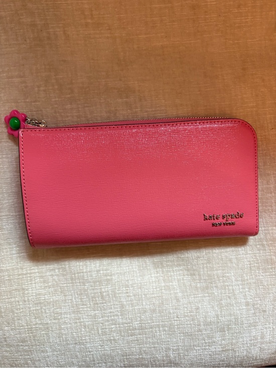 kate spade Handbags - kate spade Pink Zip-Around Saffiano Leather Wallet with Flower Pull